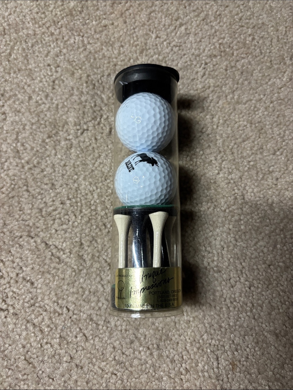 2 Golf Balls with Tees